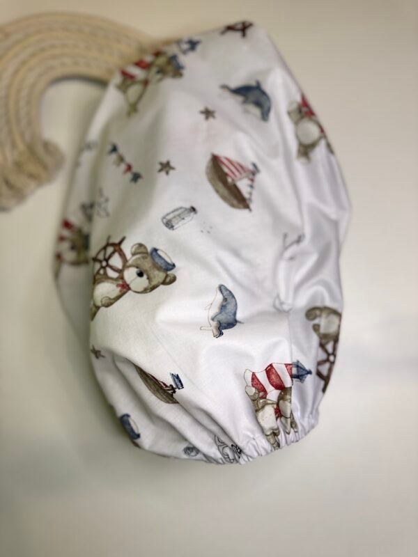 medvilnine paklode su guma, su juros ir meskuciu motyvais