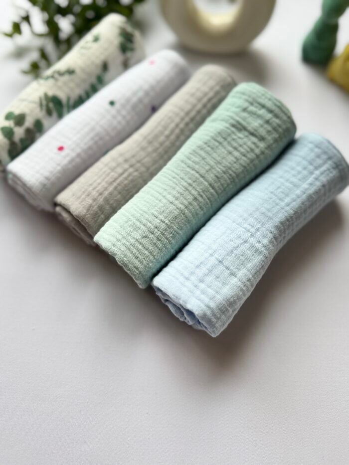Muslino merliukai Žirniukai, penki vienetai merliukų, švelnių pastelinių spalvų
